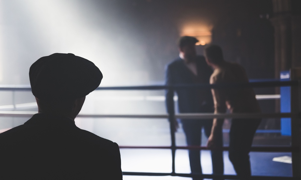 2 men in ring facing photo